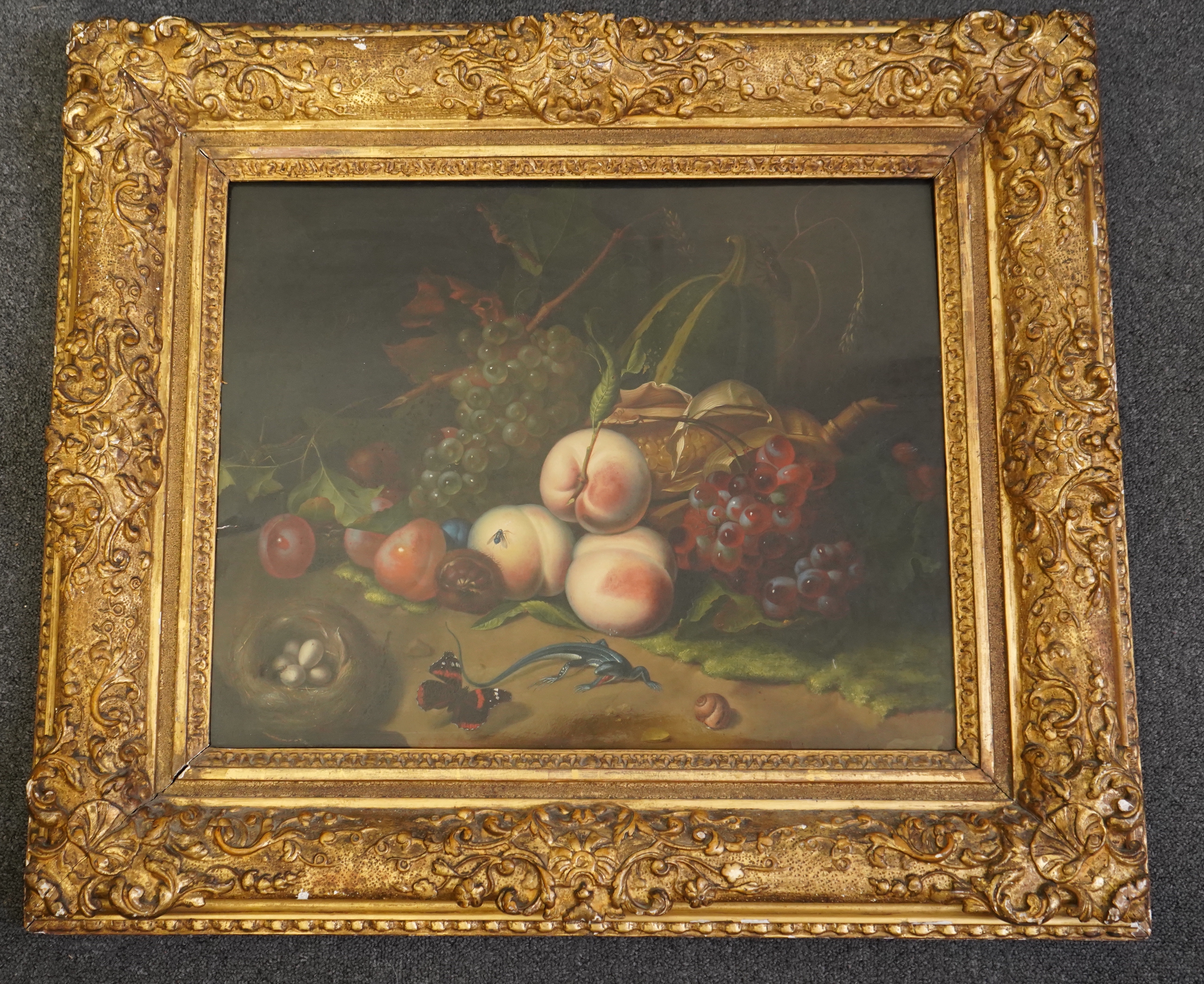 Circle of Rachel Ruysch (Dutch, 1664-1750), Still life of fruit with a lizard, bird's nest and butterfly, oil on wooden panel, 41 x 51cm